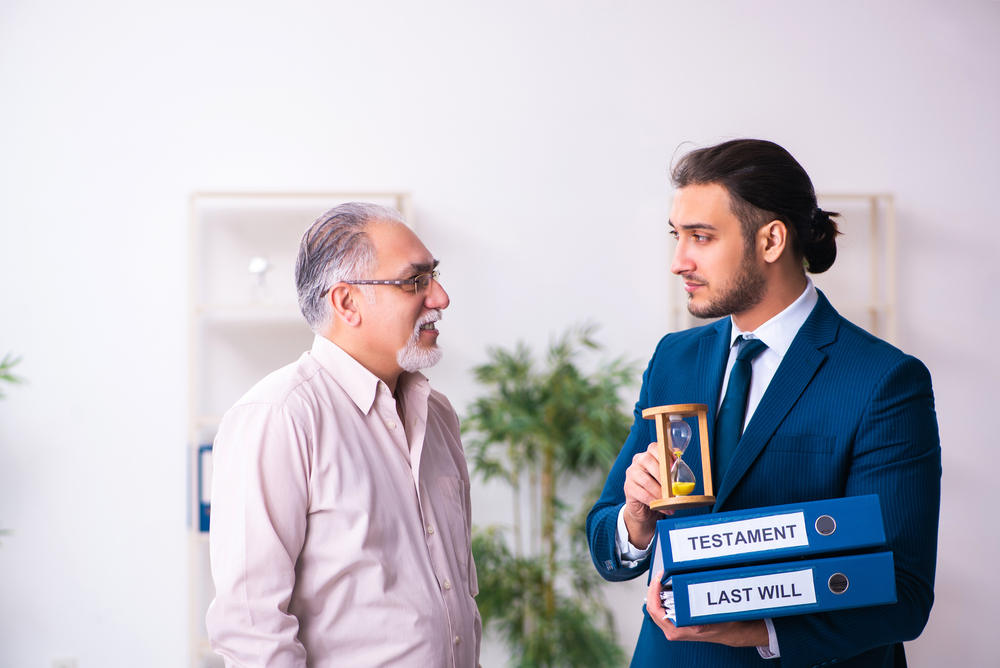 Young,Male,Lawyer,And,Old,Man,In,Testament,And,Time